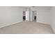 Spacious bedroom with carpet flooring and access to bathroom and other rooms at 14 Baird Cv Ln, Angier, NC 27501