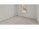 Charming bedroom with carpeted floor and a window at 14 Baird Cv Ln, Angier, NC 27501