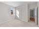 Bright bedroom with carpet flooring and double door closet at 14 Baird Cv Ln, Angier, NC 27501