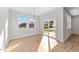 Bright dining room with hardwood floors, sliding glass doors, and chandelier at 14 Baird Cv Ln, Angier, NC 27501