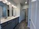 Bathroom with double sink vanity and walk in shower at 14 E American Marigold Dr # 65, Benson, NC 27504