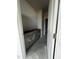 A bathroom with gray cabinets awaiting finishing touches and fixtures at 14 E American Marigold Dr # 65, Benson, NC 27504