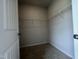 Walk-in closet with shelving for ample storage at 14 E American Marigold Dr # 65, Benson, NC 27504