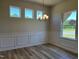 Elegant dining room with decorative molding and bright windows for a comfortable dining experience at 14 E American Marigold Dr # 65, Benson, NC 27504