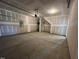 Spacious two-car garage with ample room for parking and storage, ready for your vehicles and hobbies at 14 E American Marigold Dr # 65, Benson, NC 27504