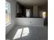 Bright kitchen area, awaiting finishing touches with lots of natural light at 14 E American Marigold Dr # 65, Benson, NC 27504