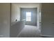 Cozy upstairs loft area featuring neutral walls and plush carpeting at 14 E American Marigold Dr # 65, Benson, NC 27504