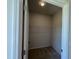 A walk-in closet with shelving for optimal storage solutions at 14 E American Marigold Dr # 65, Benson, NC 27504