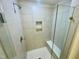 Modern shower with glass enclosure and built-in seat at 2107 Lambert Rd # 64, Cary, NC 27519