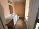 Bathroom featuring a vanity with countertop space and ample storage at 216 Parrish Farm Lane Ln, Benson, NC 27504