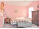 Bedroom featuring a chest and a comfortable, decorative bed at 216 Parrish Farm Lane Ln, Benson, NC 27504