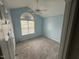Bright bedroom with vaulted ceilings, new carpet, and a large window at 216 Parrish Farm Lane Ln, Benson, NC 27504