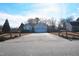 Quaint single-story home with a long driveway, complemented by neat landscaping and a serene neighborhood setting at 216 Parrish Farm Lane Ln, Benson, NC 27504