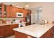 Bright kitchen featuring wooden cabinets, stainless steel appliances, and an island at 216 Parrish Farm Lane Ln, Benson, NC 27504