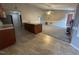 The home's eat-in kitchen features tile flooring, a peninsula counter, and an open layout at 216 Parrish Farm Lane Ln, Benson, NC 27504