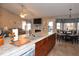 Open kitchen with an island flowing into the living and dining areas at 216 Parrish Farm Lane Ln, Benson, NC 27504