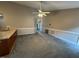 Carpeted living room with bar seating and open access to front entry, featuring ample room at 216 Parrish Farm Lane Ln, Benson, NC 27504
