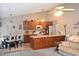 Bright and airy living space featuring a modern kitchen with a central island, connected to a cozy living room at 216 Parrish Farm Lane Ln, Benson, NC 27504