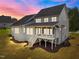Two-story home with screened porch, deck and landscaped yard at 2404 Toll Mill Ct, Raleigh, NC 27606