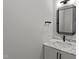 Modern bathroom with a floating vanity and a frameless mirror at 2404 Toll Mill Ct, Raleigh, NC 27606