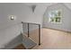 Spacious bonus room with hardwood floors and a large window at 2404 Toll Mill Ct, Raleigh, NC 27606