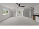 Bonus room featuring a ceiling fan and plenty of natural light at 2404 Toll Mill Ct, Raleigh, NC 27606