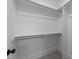 Large walk-in closet with double hanging rods at 2404 Toll Mill Ct, Raleigh, NC 27606