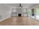 Spacious living room featuring a fireplace and hardwood floors at 2404 Toll Mill Ct, Raleigh, NC 27606