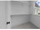 Bright walk-in closet with ample shelving and hanging space at 2404 Toll Mill Ct, Raleigh, NC 27606