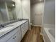 Bathroom with granite countertops and a shower at 257 Magnolia Run Way, Benson, NC 27504