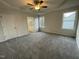 Spacious bedroom with carpet flooring and ceiling fan at 257 Magnolia Run Way, Benson, NC 27504