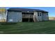 Gray house exterior with wooden deck and stairs at 257 Magnolia Run Way, Benson, NC 27504