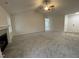 Living room with fireplace and access to other rooms at 257 Magnolia Run Way, Benson, NC 27504