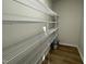 Walk-in pantry with wire shelving for ample storage at 257 Magnolia Run Way, Benson, NC 27504