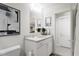 This bathroom features a granite countertop and a white basin sink at 3019 White Rail Dr, Fuquay Varina, NC 27526