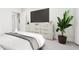 Bedroom featuring a television, dresser, and neutral decor at 3019 White Rail Dr, Fuquay Varina, NC 27526