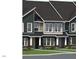 Charming townhome exteriors featuring manicured lawns and inviting entryways at 3019 White Rail Dr, Fuquay Varina, NC 27526