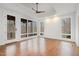 Bright bedroom with hardwood floors and large windows at 39415 Glenn Glade, Chapel Hill, NC 27517