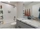 Bathroom showcasing white subway tile, a black shower head, and a gray vanity with a marble countertop at 412 Jerome Rd, Durham, NC 27713