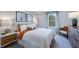 Comfortable bedroom with a bed, stylish furniture, and a large window offering natural light at 8701 Wardle Ct, Wake Forest, NC 27587