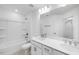 Bathroom with double sinks, quartz countertops, bath, and shower at 8703 Wardle Ct, Wake Forest, NC 27587