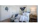 Charming bedroom featuring a cozy daybed, stylish decor, and soothing ambiance at 8703 Wardle Ct, Wake Forest, NC 27587