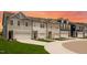 New townhomes with a well-manicured lawn at 8703 Wardle Ct, Wake Forest, NC 27587
