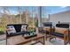 Outdoor patio with comfortable seating area provides an inviting space for relaxation and entertainment at 8716 Wardle Ct, Wake Forest, NC 27587