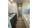 Bathroom with double vanity, granite countertop, and soaking tub at 90 Faucette Dr, Selma, NC 27576
