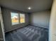 Spacious bedroom with carpet and dual windows at 90 Faucette Dr, Selma, NC 27576