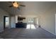 Open-concept living room with kitchen and dining area at 90 Faucette Dr, Selma, NC 27576