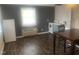 Small kitchen with white appliances and wood-look flooring at 943 St Marys St # B, Raleigh, NC 27605