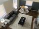A high angle view of a living room featuring lots of natural light and modern furniture at 943 St Marys St # B, Raleigh, NC 27605