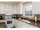 White kitchen cabinets and granite countertops at 1001 Chimney Hill Dr, Apex, NC 27502